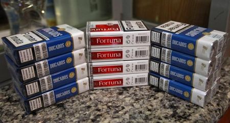 © Reuters. Cigarette packs of Imperial Tobacco are pictured at a tobacco store in Madrid