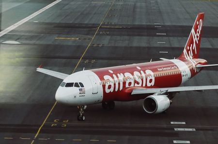 © Reuters. An AirAsia plane is seen on the runway at Kuala Lumpur International Airport