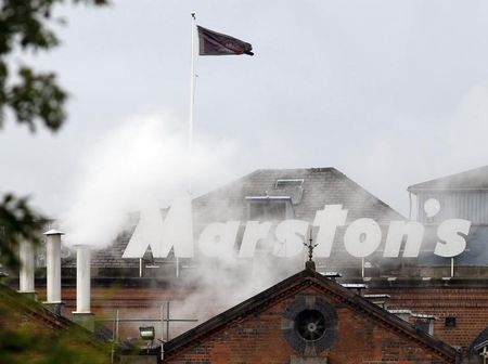 © Reuters. Steam rises from the Marston's Brewery in Burton upon Trent