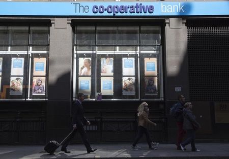 © Reuters. People walk past a branch of the Co-operative bank in central London