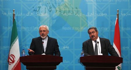© Reuters. العراق يدعو لتحرك دولي ضد الدولة الاسلامية وإيران تتعهد بالتضامن