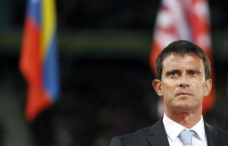 © Reuters. French Prime Minister Manuel Valls attends the opening ceremony of the world Equestrian Games at the d'Ornano stadium in Caen