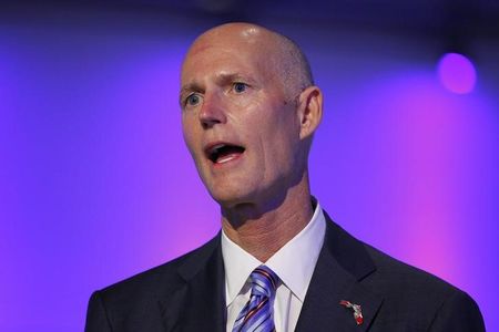 © Reuters. Florida Republican Gov. Rick Scott speaks at a ceremony opening new newsroom facilities for the Univision and Fusion television networks in Doral