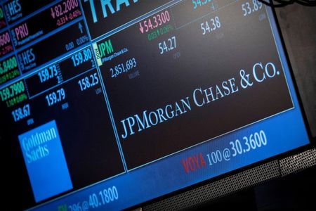 © Reuters. A screen displays JP Morgan Chase & Co. at the post that the stock is traded at on the floor of the New York Stock Exchange