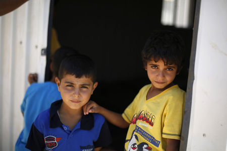 © Reuters. Crianças refugiadas sírias no campo de Azraq 