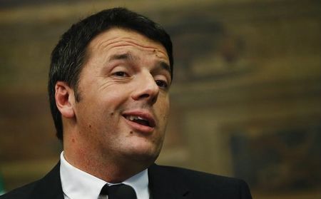 © Reuters. Italian Prime Minister-designate Renzi talks to reporters at the end of the consultations with leaders of Italian parties at the Parliament in Rome