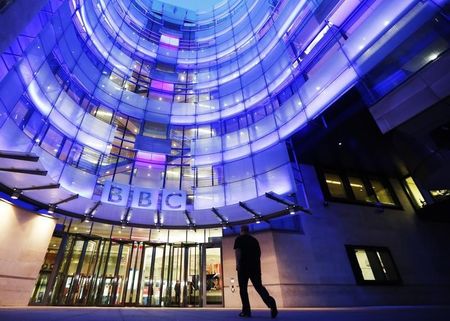 © Reuters. A man enters BBC New Broadcasting House in London