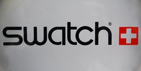 © Reuters. The logo of Swiss watchmaker Swatch is seen on the door of a Swatch watches shop in Strasbourg
