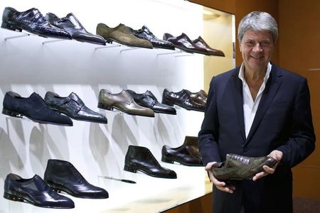 © Reuters. Yves Carcelle, chairman and CEO of Louis Vuitton Malletier, poses for a photograph after an interview with Reuters at the largest China LV store in Shanghai