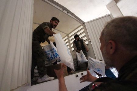 © Reuters. برنامج الأغذية: 4.1 مليون شخص في سوريا تسلموا حصص غذاء في اغسطس
