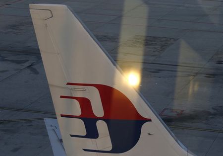 © Reuters. The tail wing of a Malaysia Airlines jet is seen at Kuala Lumpur International Airport