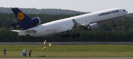 © Reuters. A McDonnell-Douglas MD-11 jet of Lufthansa Cargo AG taxis along the tarmac of Yemelyanovo airport