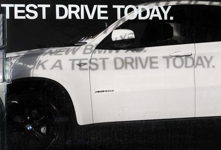 © Reuters. A new BMW is advertised to be test driven at a car dealership at Portslade near Brighton