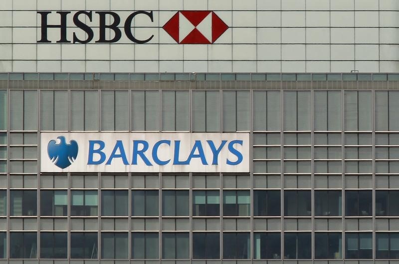 &copy; Reuters The HSBC and the Barclays buildings are seen in the Canary Wharf business district, in East London
