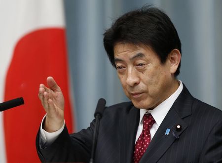 © Reuters. File picture shows Japan's new Labour, Health and Welfare Minister Shiozaki speaking during a news conference at Prime Minister Shinzo Abe's official residence in Tokyo