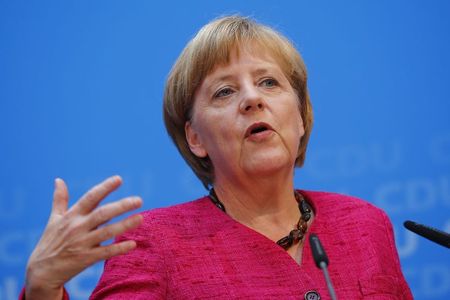 © Reuters. German Chancellor and CDU head Merkel  speaks at news conference after Sunday's Saxony local election in Berlin