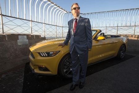 © Reuters. Ford Motor Co. Executive Chairman Bill Ford poses with the new 2015 Ford Mustang GT in New York