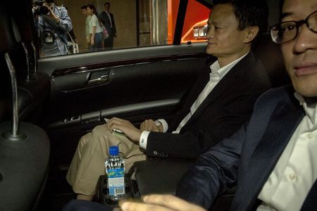 © Reuters. Jack Ma, the founder and executive chairman of Alibaba Group Holding, exits following the companies Road Show in New York