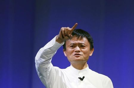 © Reuters.  Ma, the founder and executive chair of Alibaba Group Holding, speaks during the SoftBank World 2014 event in Tokyo