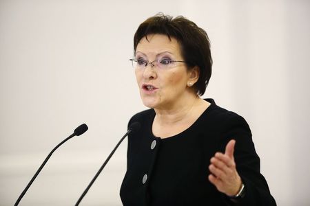 © Reuters. Poland's parliament speaker Kopacz speaks to media before a session at the Parliament in Warsaw