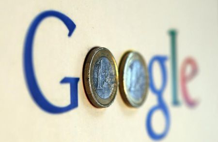 © Reuters. An illustration picture shows a Google logo with two one Euro coins