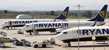 © Reuters. Ryanair planes are seen parked at Girona airport