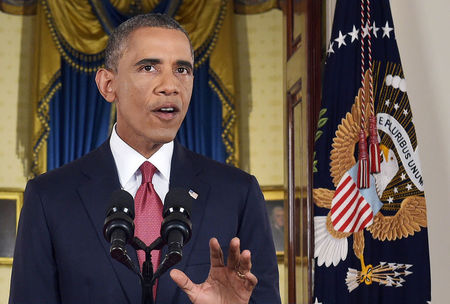 © Reuters. U.S. President Obama delivers a live televised address to the nation on his plans for military action against the Islamic State, from the Cross Hall of the White House in Washington