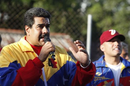 © Reuters. Venezuela's President Nicolas Maduro speaks during a visit to a community near Valencia, in the central state of Carabobo
