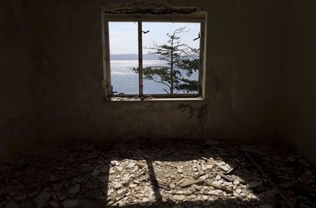 © Reuters. An interior view of a damaged prison building on the Goli Otok (Barren Island)