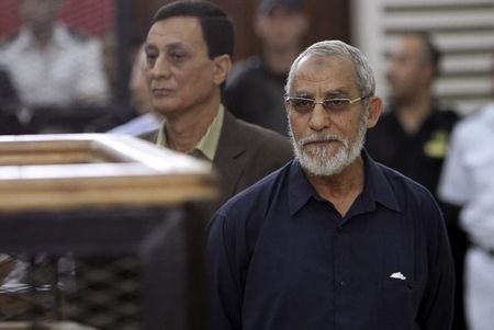 © Reuters. Muslim Brotherhood's Supreme Guide Mohamed Badie looks on during his trial in Cairo