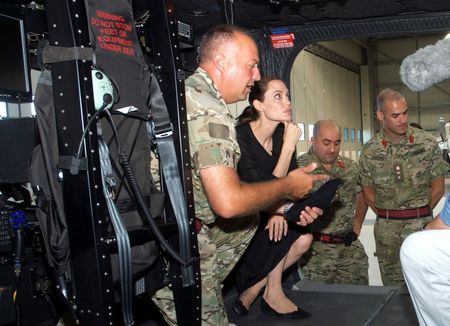 © Reuters. U.S. actress and UNHCR Special Envoy Angelina Jolie sits in a rescue helicopter during a visit to the Armed Forces of Malta Air Wing outside Valletta