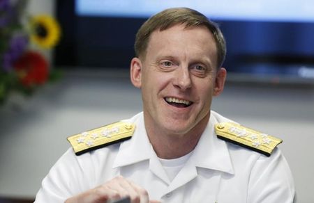 © Reuters. National Security Agency (NSA) Director Admiral Michael Rogers smiles at a Reuters CyberSecurity Summit in Washington