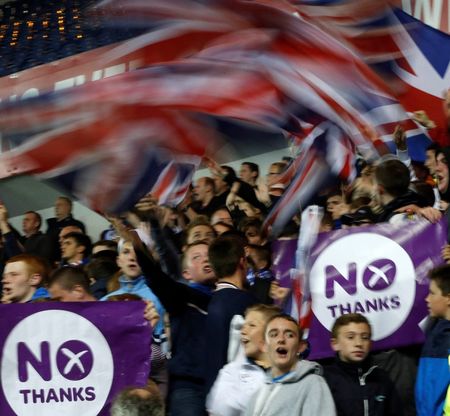 © Reuters. Rangers fans display No Thanks posters during the Rangers versus Inverness Caledonian Thistle soccer match in Glasgow