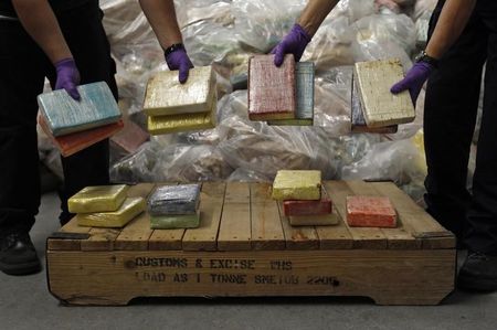 © Reuters. Cocaine from Britain's largest ever cocaine seizure is displayed by UK Border Agency staff in London