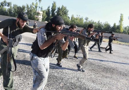 © Reuters. مجلس النواب الامريكي يؤيد خطة اوباما لتسليح وتدريب مسلحين سوريين معتدلين