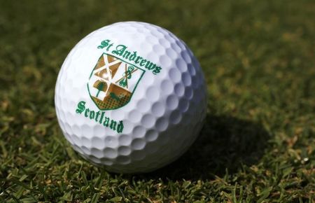 © Reuters. A St. Andrews souvenir golf ball is seen on a golf course in London