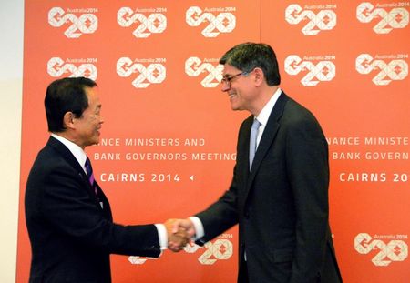 © Reuters. Japan's Finance Minister Taro Aso and U.S. Treasury Secretary Jack Lew shake hands before the start of their bilateral meeting ahead of the G20 Finance Ministers and Central Bank Governors meeting in Cairns