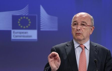 © Reuters. EU Competition Commissioner Almunia addresses a news conference in Brussels