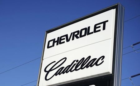 © Reuters. The sign at a Chevrolet and Cadillac General Motors store is seen at a dealer in Wheat Ridge