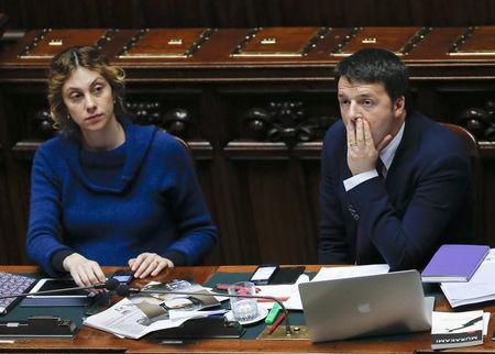 © Reuters. Italy's Prime Minister Matteo Renzi attends a confidence vote at the lower house of the parliament in Rome