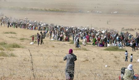 © Reuters. رئيس كردستان العراق يحث المجتمع الدولي على حماية مدينة سورية