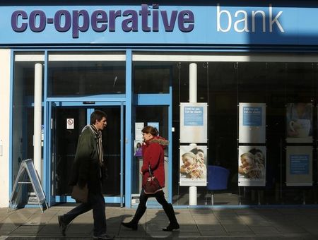 © Reuters. People pass a Co-operative Bank  in Brighton in southern England