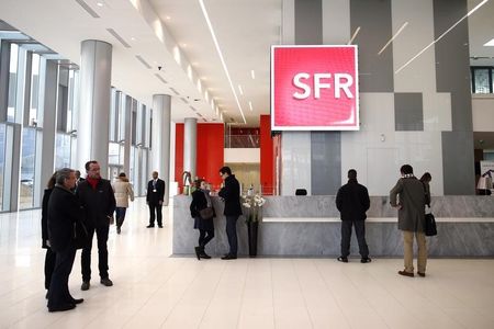 © Reuters. LE RACHAT DE SFR PAR NUMERICABLE AUTORISÉ SOUS CONDITIONS