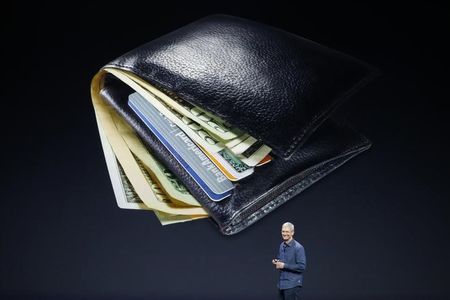 © Reuters. Apple CEO Tim Cook speaks about Apple Pay during an Apple event at the Flint Center in Cupertino