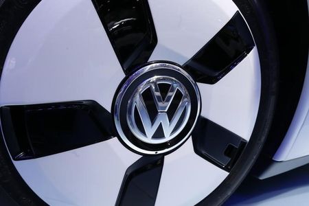 © Reuters. The VolksWagen logo is seen on their XL 1 car during the media day at the Paris Mondial de l'Automobile