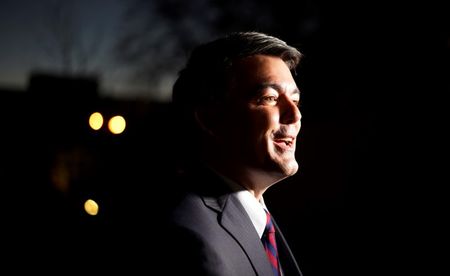 © Reuters. File photo of Cory Gardner, Republican U.S. Senate candidate talking to a guest at the Hispanic Chamber of Commerce of Metro Denver