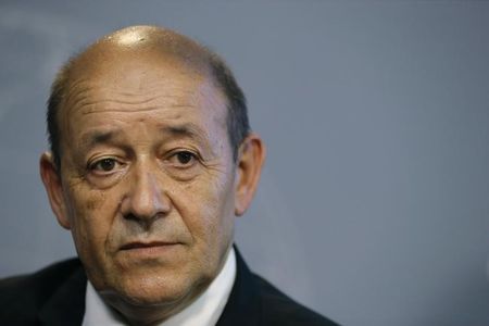 © Reuters. France's Defence Minister Jean-Yves Le Drian attends a news conference in Paris