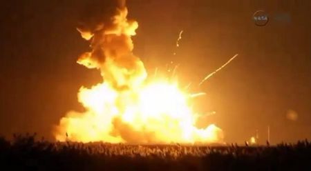 © Reuters. An unmanned Antares rocket is seen exploding seconds after lift off from a commercial launch pad in this still image from NASA video at Wallops Island