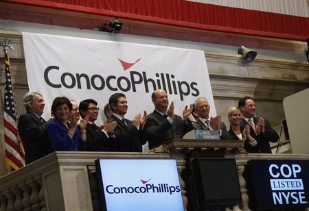 © Reuters. ConocoPhillips Chairman and CEO Lance rings the closing bell at the New York Stock Exchange