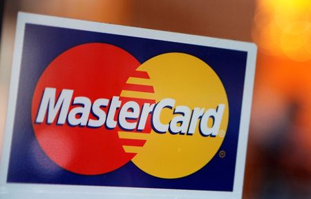 © Reuters. File photo of a MasterCard logo is seen on a door outside a restaurant in New York